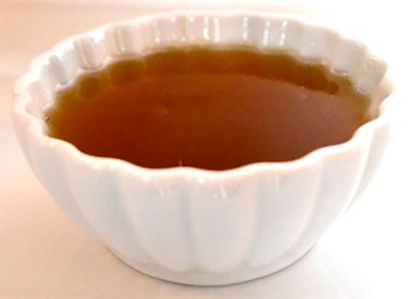 Beurre noisette presented in a white bowl