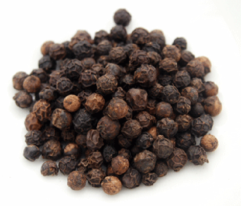 Black peppercorns in a white bowl