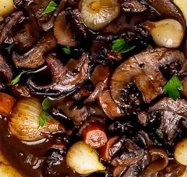 Bourguignon garnish of mushrooms and baby onions in a red wine sauce