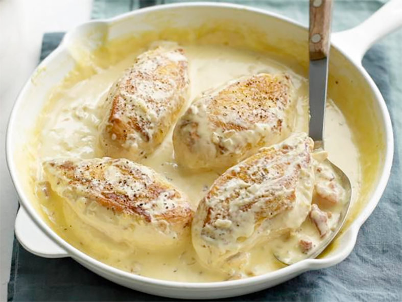 Chicken supreme, four chicken breasts (supremes) cooked in supreme sauce