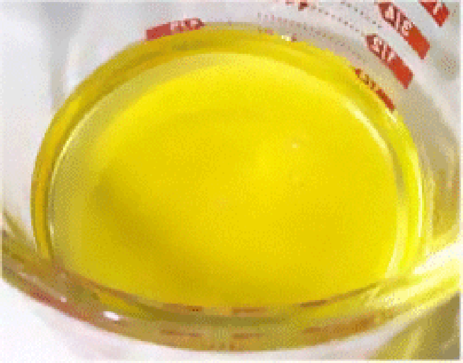 Melted clarified butter in a measuring jug
