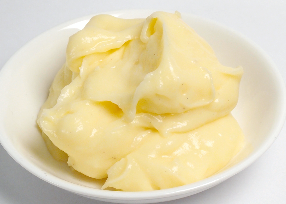 Creme patissiere on a small white plate