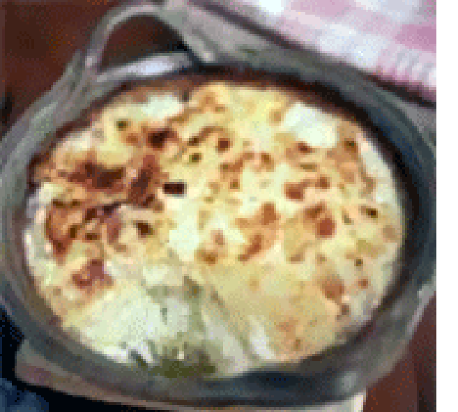 Dauphinoise potatoes in a gratin dish