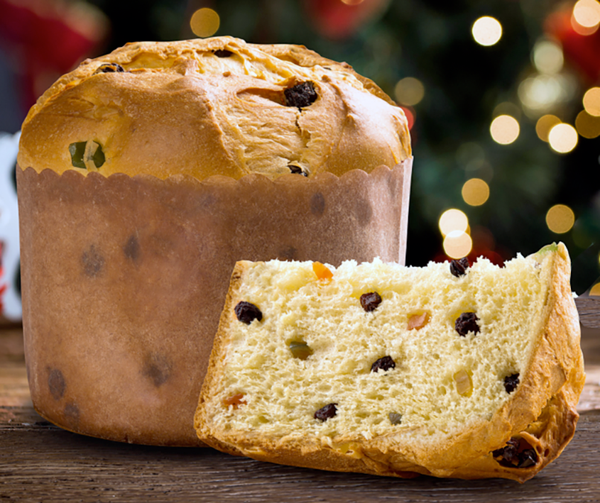 Panettone loaf with slice in front