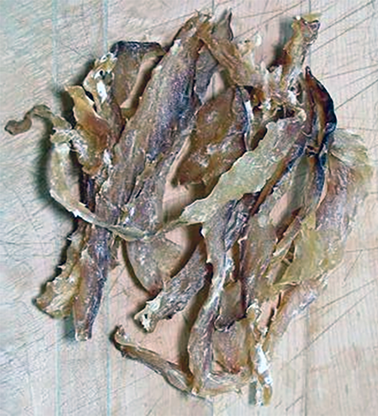 Single piece of stockfish, dried fish used for flavouring