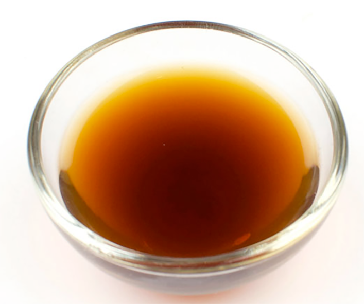 Vanilla extract in a glass bowl