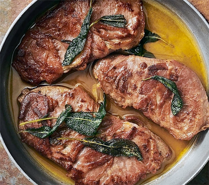 Veal saltimbocca, thin veal steaks cooked in butter and olive oil and served garnished with sage
