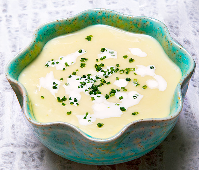 Classic Vichyssoise soup served in a white soup bowl
