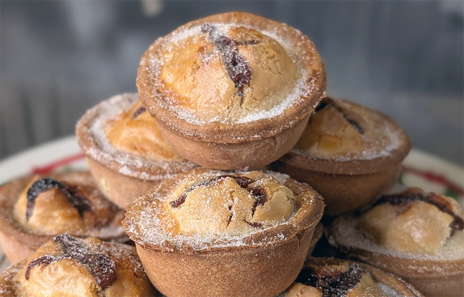 mince pies piled as a pyramid on a plate