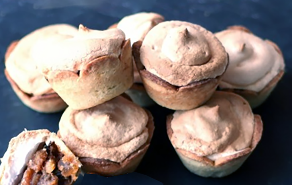 meringue topped royal mince pies on a slate