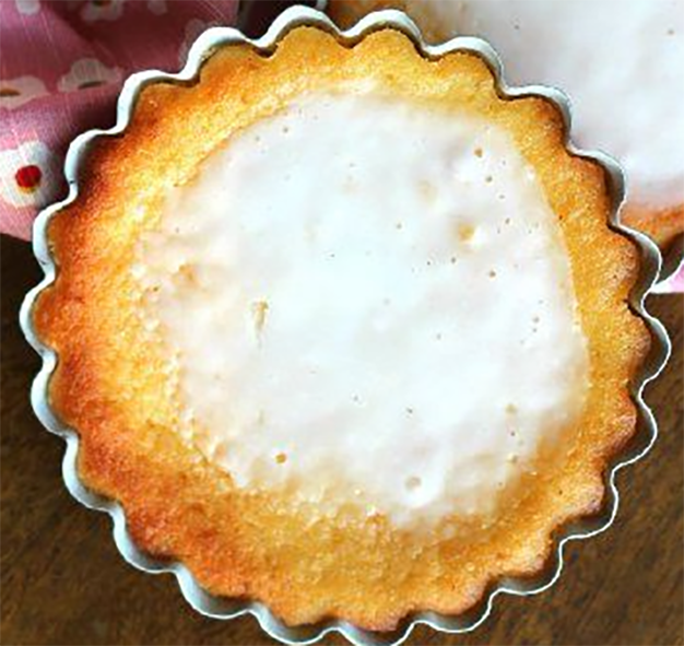 almond cheesecake baked in an individual metal mould
