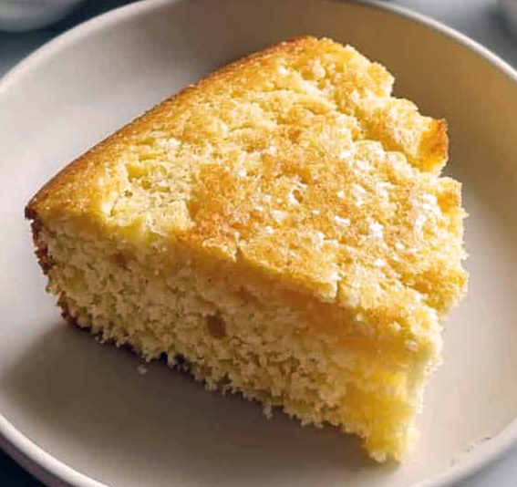 wedge of amish cornbread on a plate