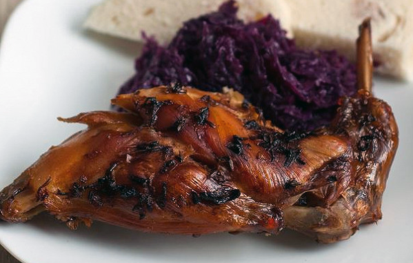 braised rabbit served with red cabbage