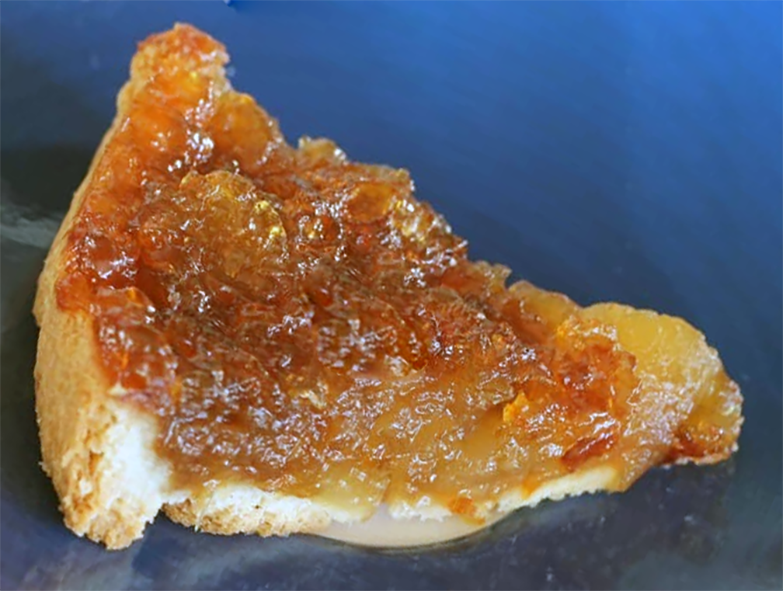 slice of apple marmalade tart on a plate