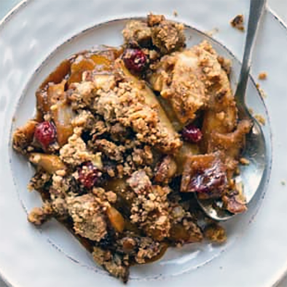 apple and tamarillo gingerbread cobbler served on a plate