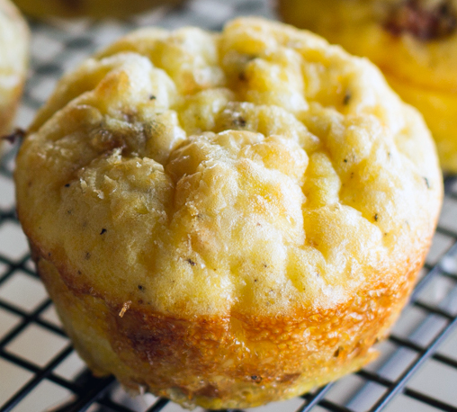 muffin with bacon and onion cooling on a wire rack