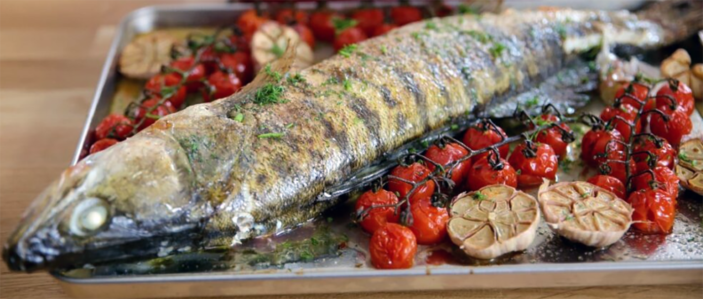 baked pike in a roasting tin
