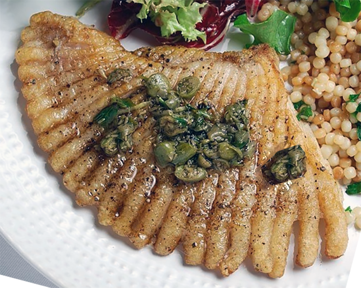 boiled skate wings topped with caper suce