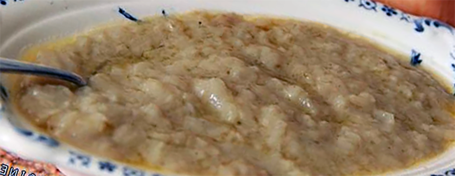 Sauce Robert or brown mustard sauce in a serving dish with a spoon