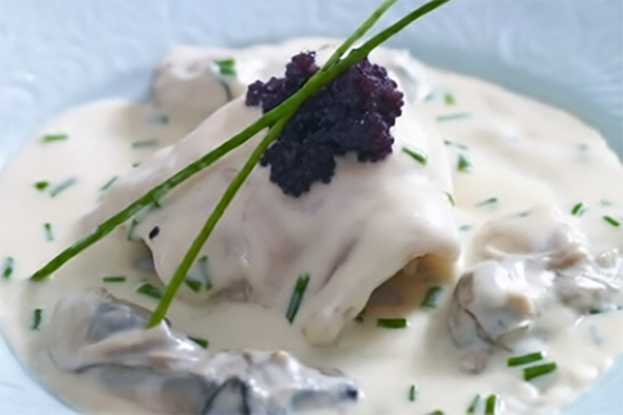 turbot served with a cream sauce
