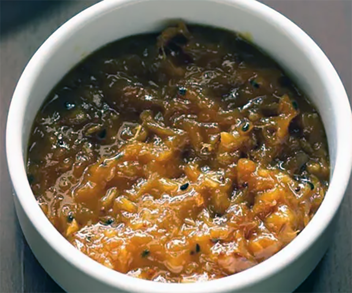 Bengali-style mango chutney in a small white dish