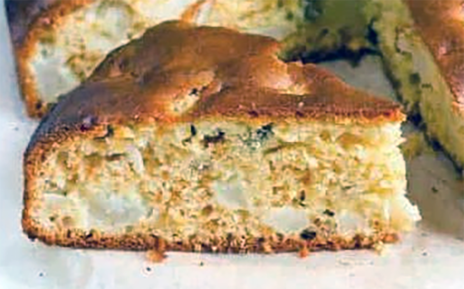 single slice of Ecuadorian apple and walnut cake on a plate