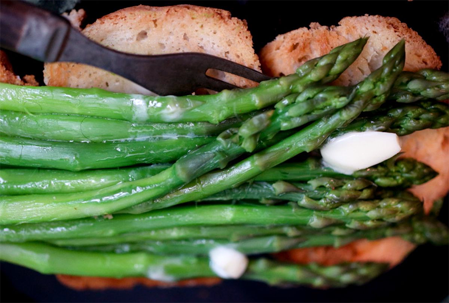 boiled asparagus with butter on toast