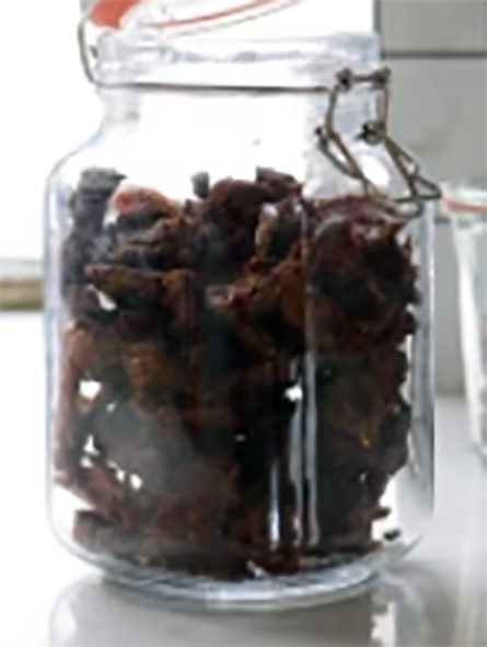 candied elcampane in a glass jar