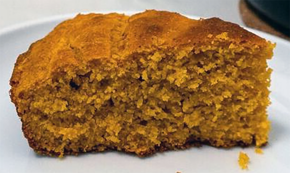 slice of chilli spiced pumpkin cornbread on a plate