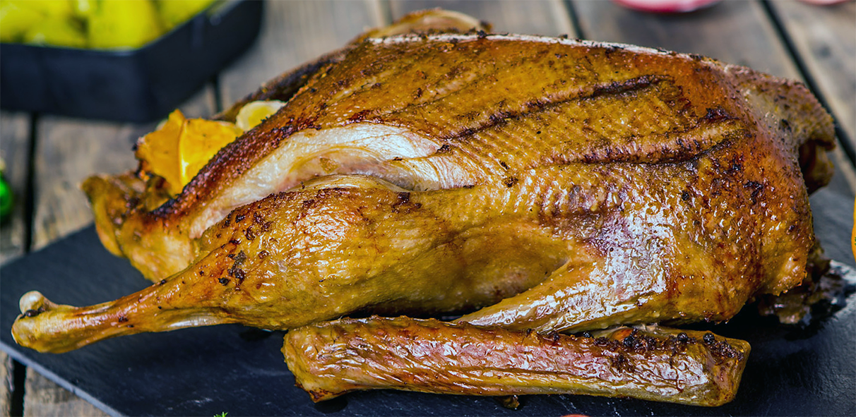 Christmas roast goose presented on a slate