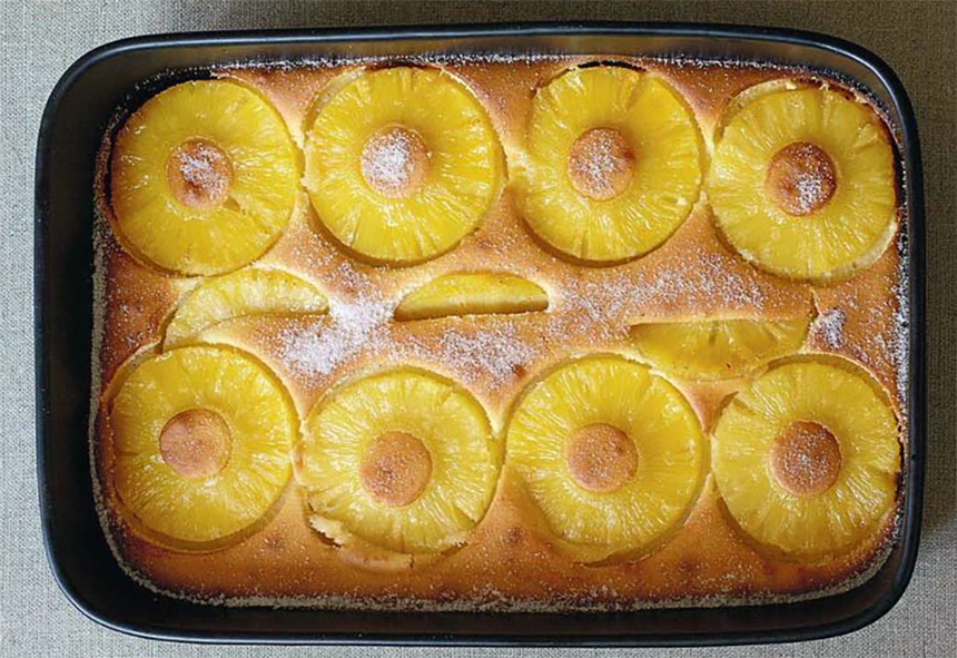 pineapple clafoutis in a rectangular baking dish