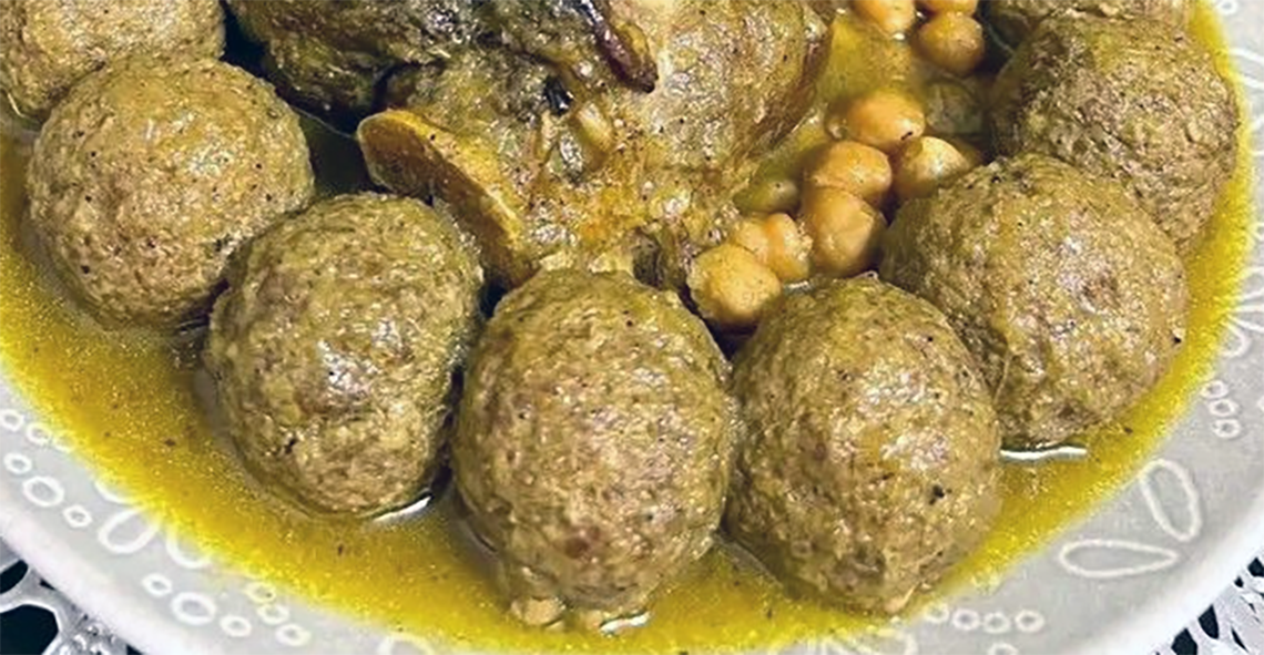 coclo, large Algerian meatballs served with chickpeas around a joint of meat
