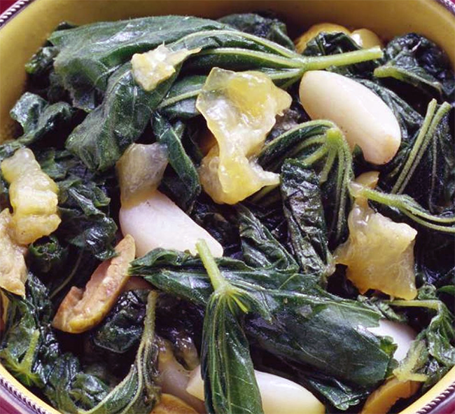 common mallow shoots and leaves with garlic, wine, lemon juice and herbs