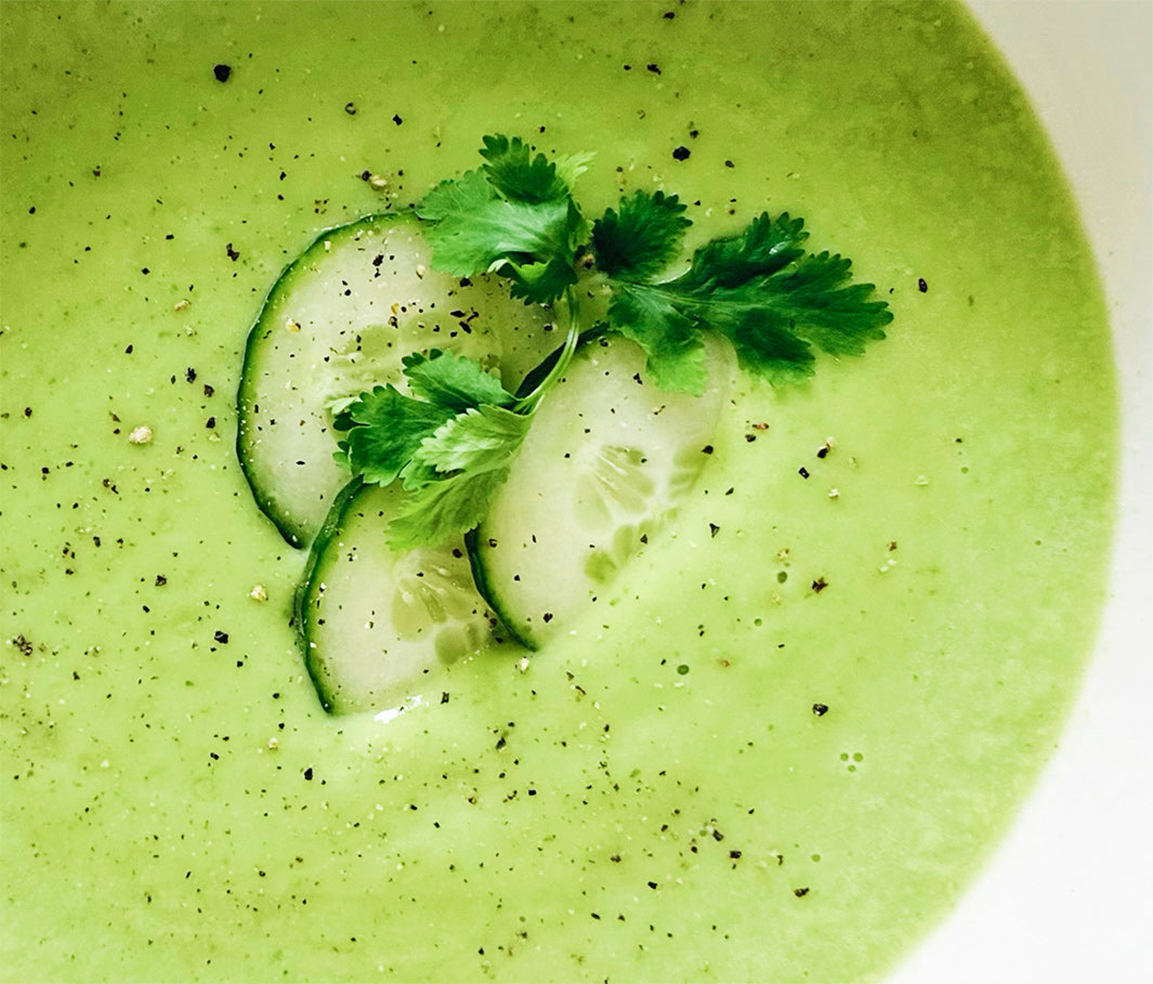 creme verde, French green soup with milk and prawns garnished with cucumber slices
