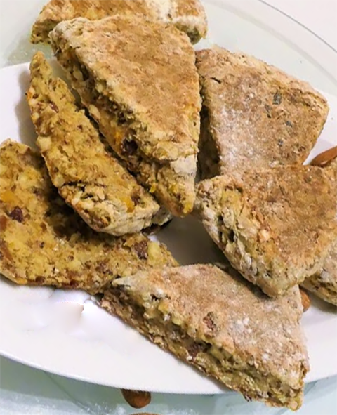 Irish griddle scones shaped as wedges piled on a plate