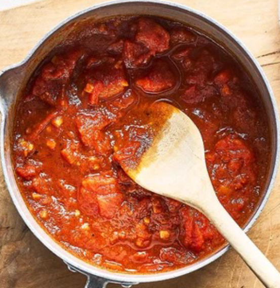 enchilada sauce in a small saucepan