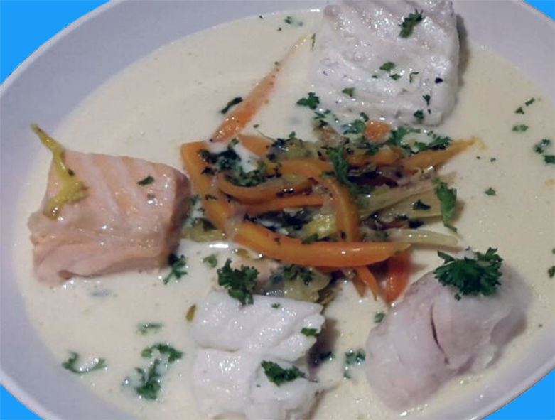 waterzooi with fish chunks served on a plate