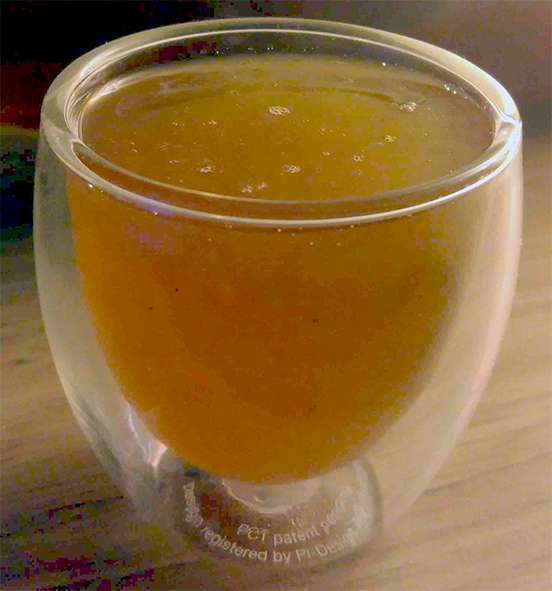 Apple and calvados jelly presented in a double-walled glass