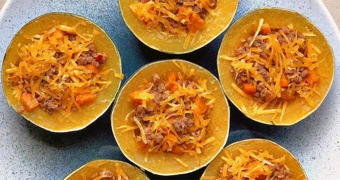 gem squash halves stuffed with braised mince and topped with grated cheese
