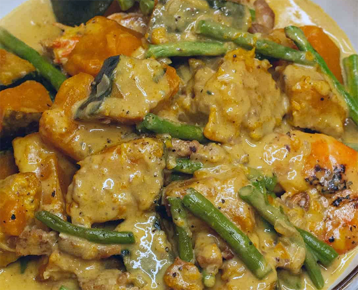 ginataang kalabasa served in a bowl