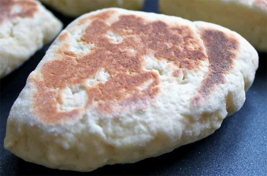 triangular gridle (griddle) scone on a baking tray