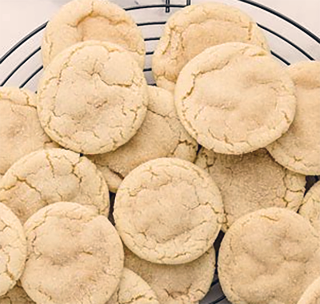basic common biscuits piled on a cooling rack