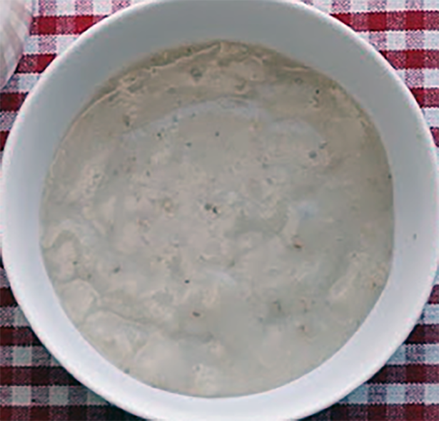 oatmeal flummery in a bowl ready for topping