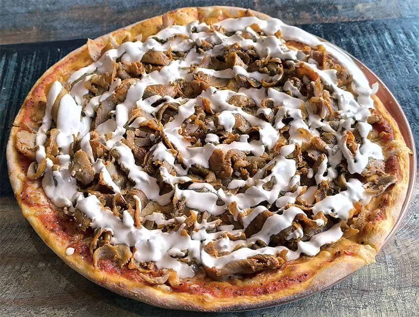 Swedish kebab pizza on a plate