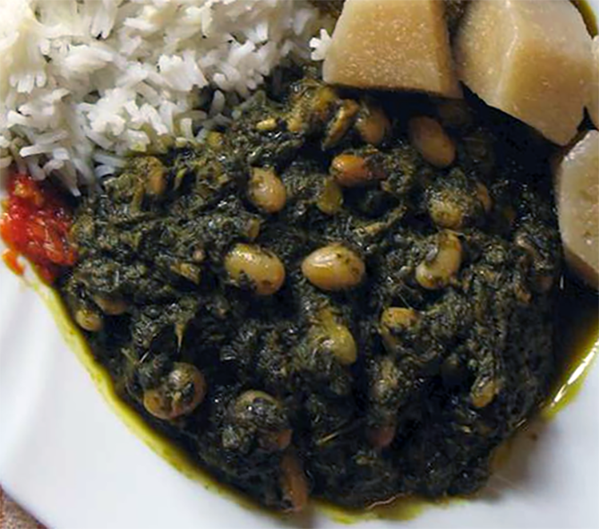 Kizaca served with boiled cassava, rice and a pounded hot chilli
