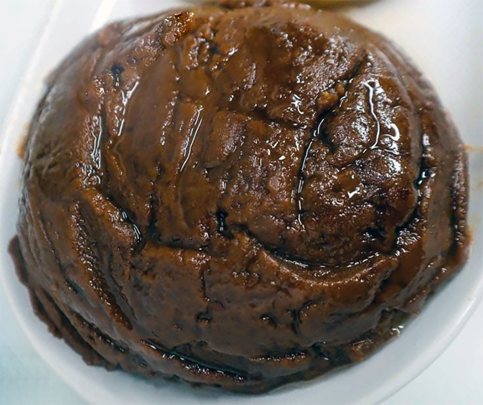 kpe, Central African Republic peanut paste on a white dish