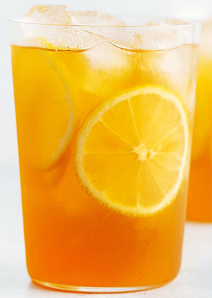 home-made diet lemon snapple iced tea served over ice and lemon slices in a glass