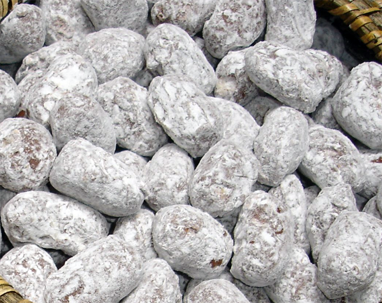 lozenge-shaped muskadine comfits dusted with icing sugar