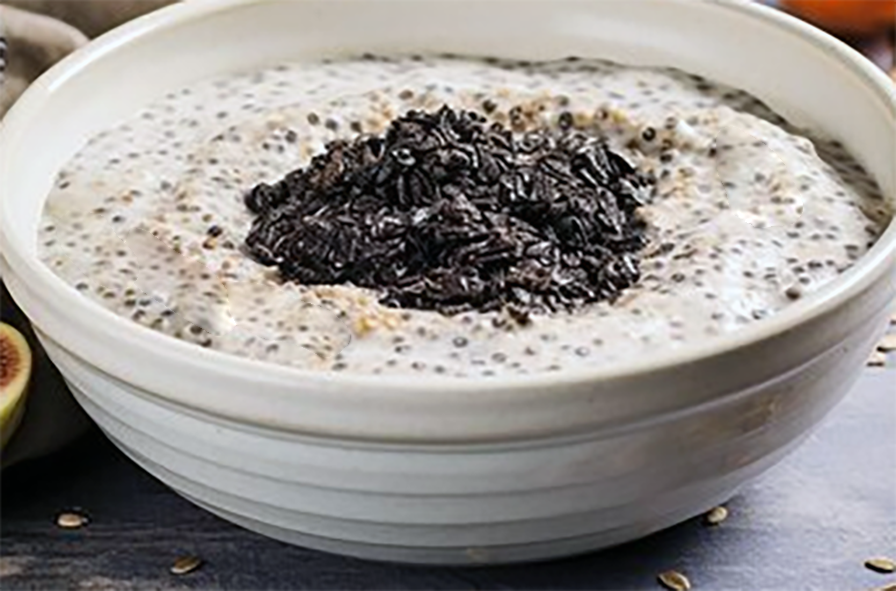 Christmas porridge with prunes served in a bowl