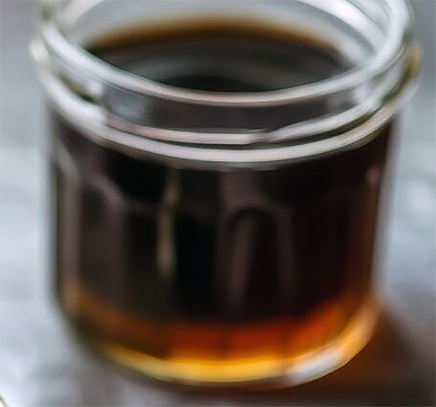 mallow flower syrup in a glass jar
